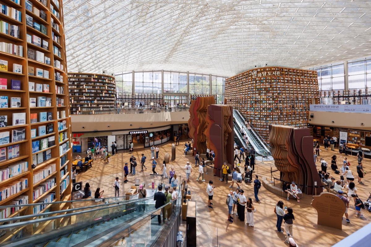 Visitors explore the Starfield Library inside COEX Mall, one of the most recognizable public spaces and attractions in Seoul, South Korea.