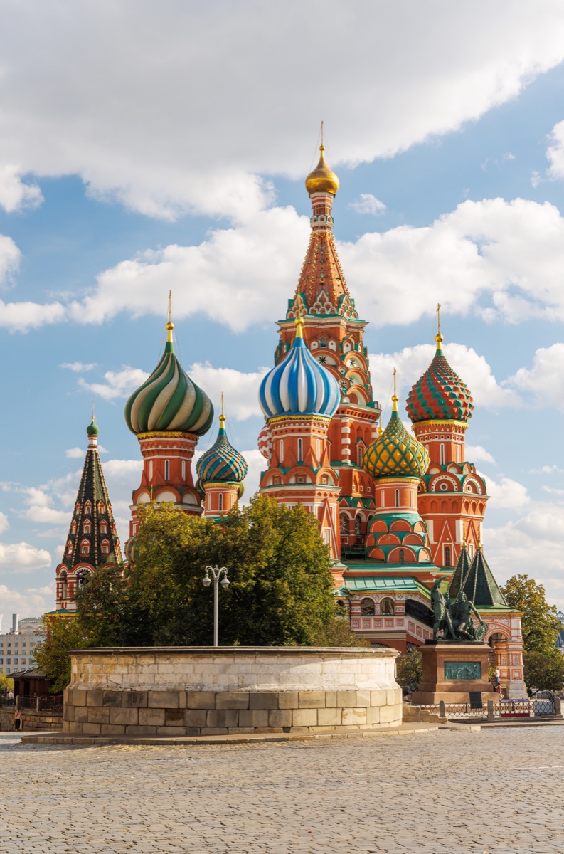 The circular stone platform of Lobnoye Mesto occupies the foreground below Saint Basil's Cathedral on Red Square, Moscow, Russia